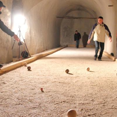Playing boules in the underground fortress on Goli Vrh