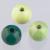 Lesene perle TiT, 10 mm, zelene, mešane, 69 kosov