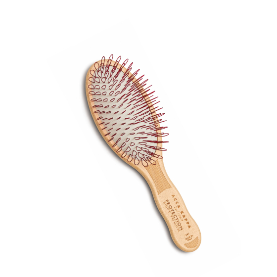 Krtača za nežno masažo lasišča