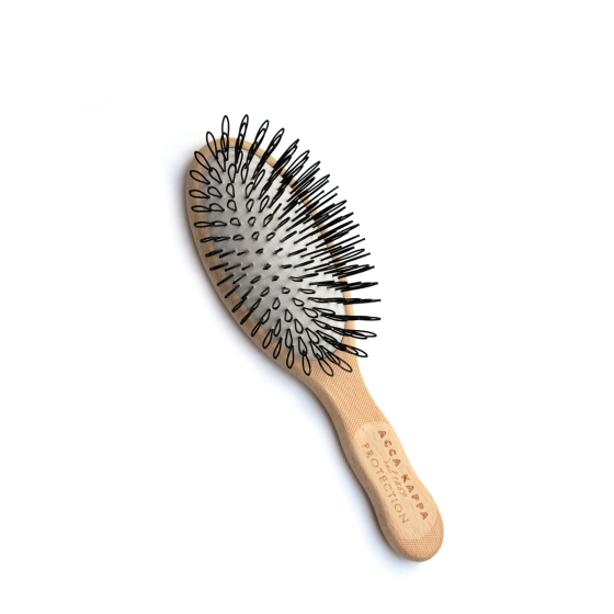 Krtača za nežno masažo lasišča